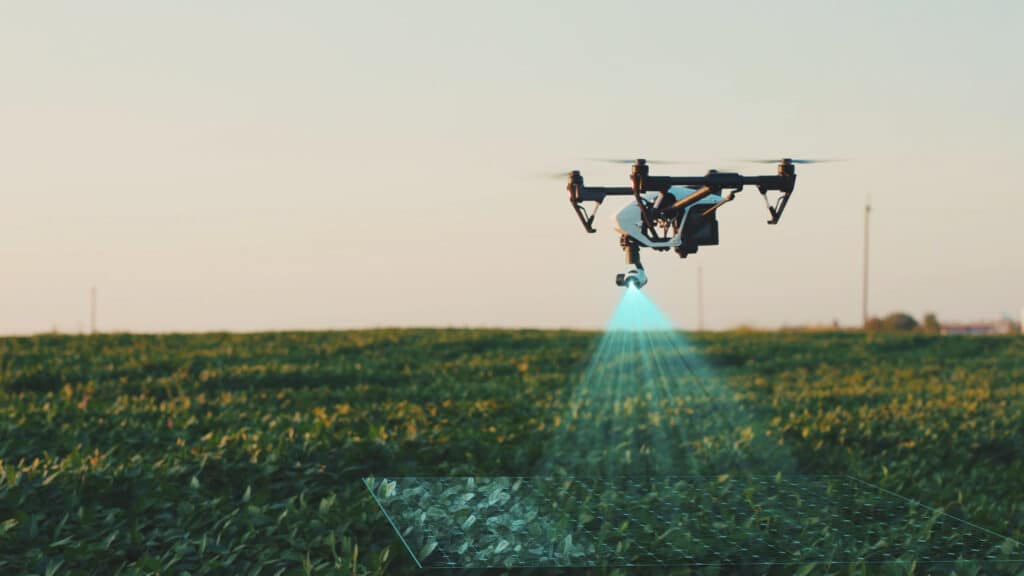 Robot drone flying over a field indentifying needs to maintain ecological balance within smart agriculture.